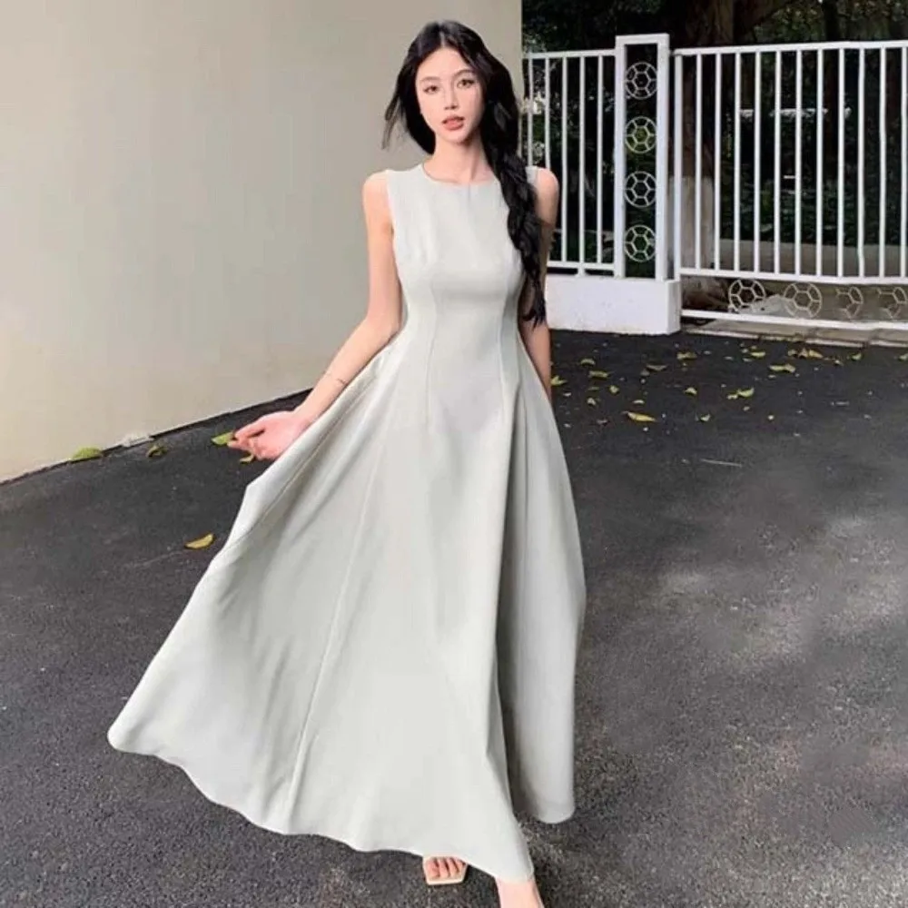 Ins Fashion U الرقبة بلا أكمام فستان طويل مزاجه سترة دون أكمام بلون تنورة طويلة ألف خط طويل المرأة فستان كوري الطرف
