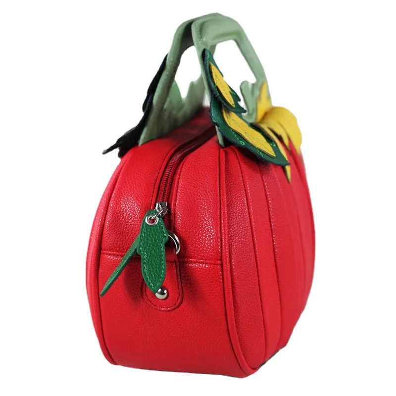 New leather women\'s bag in spring and summer Handheld one shoulder messenger bag Small round bag Pumpkin creative bag