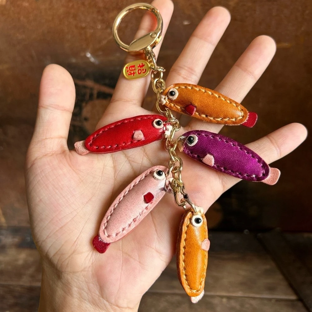 

First-layer cowhide colorful fish string bag charm, car keychain, car ornament, surplus year after year pendant