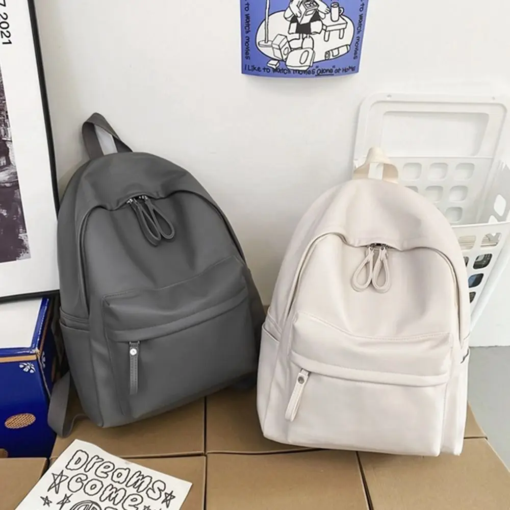 1Pcs New Large Capacity PU Leather Backpack Solid Color Waterproof School Bag Unisex Portable Couple Backpack Men Women