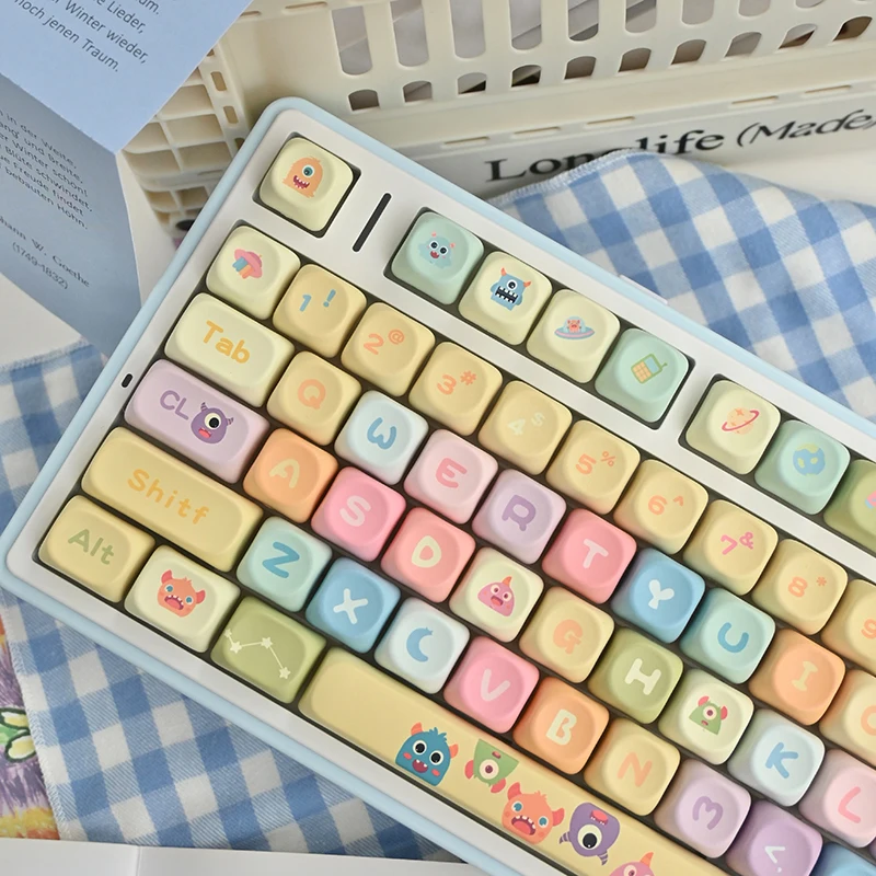 

Cute little monsterQCute Sublimation Keyboard KeycapsMOACustomized Rainbow Mechanical Keyboard Keycaps