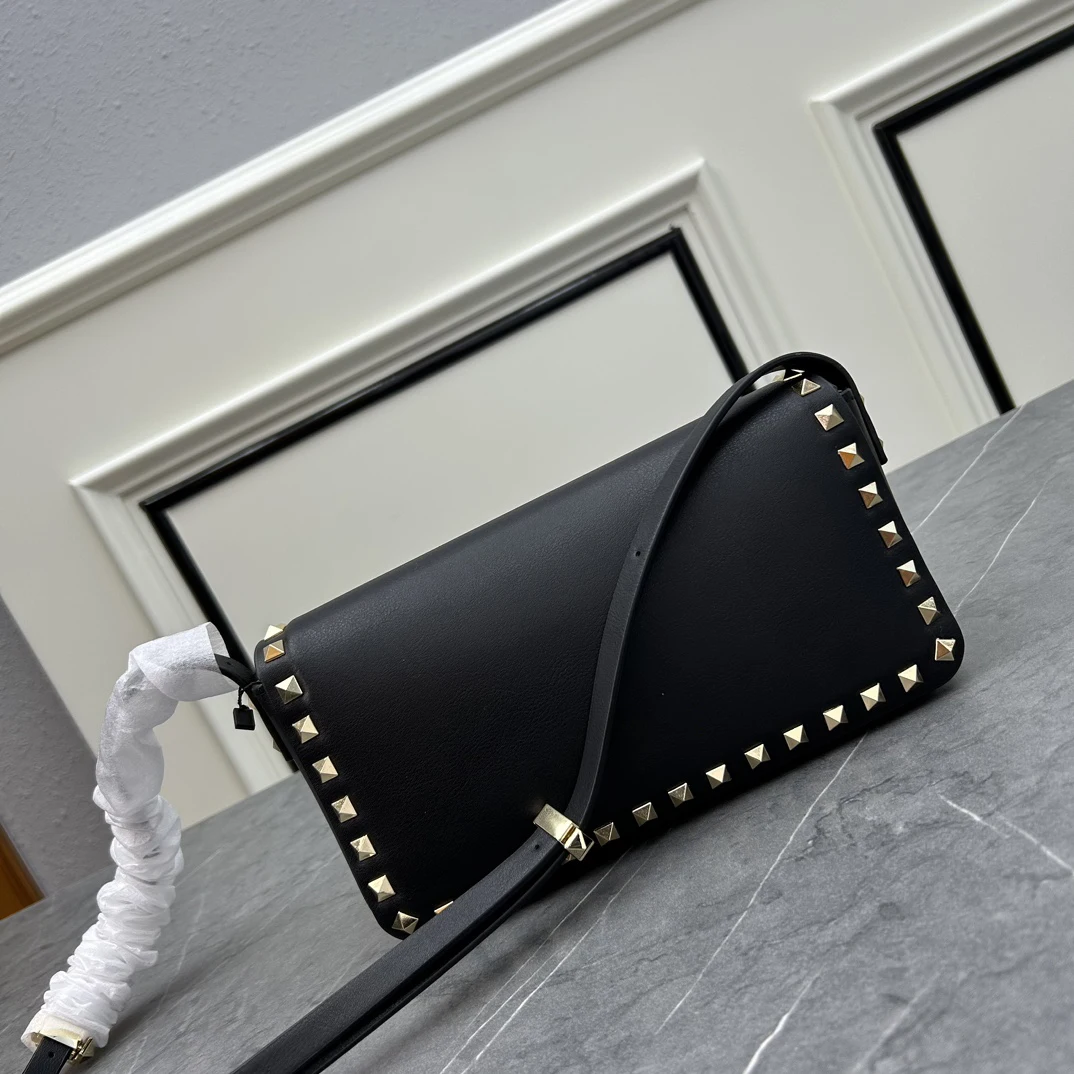 2024 New Arrival! Sleek Black Leather Shoulder Bag with Golden Rivets, Adjustable Strap, Platinum-Plated Hardware