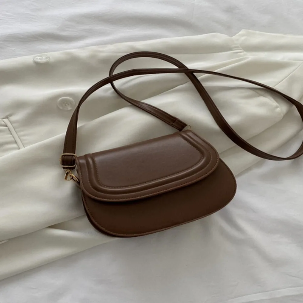 

Minimalist Solid Color Mini Saddle Bag - Embossed Crossbody Design For Daily Commute & Dates