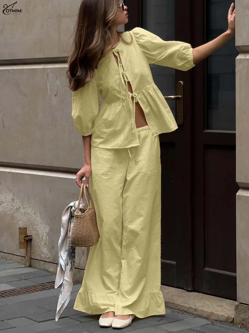 ชุดเซ็ต 2 ชิ้น ผ้าฝ้ายสีเหลืองลำลองสำหรับผู้หญิง แฟชั่นเสื้อครอปแขนสั้นคอโอผูกเชือก และกางเกงขายาวจีบระบายผูกเชือก
