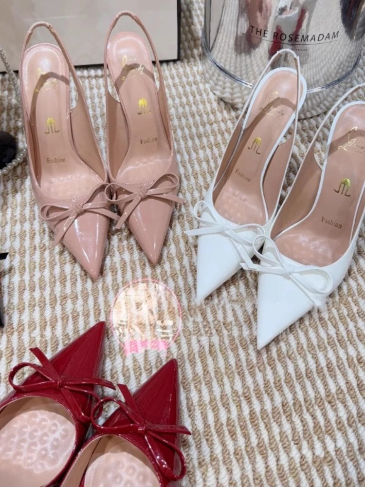 

Naked high heels for women 2025new style pointed shallow bow bow thin heel versatile summer red sole single button women's shoes