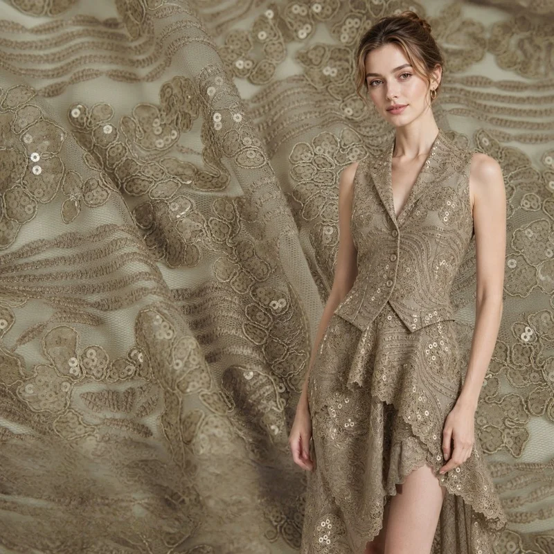 2Code Heavy Embroidery Soft, stretchy, brown-toned mesh fabric with sequin embellishments, suitable for dresses, gowns, and desi