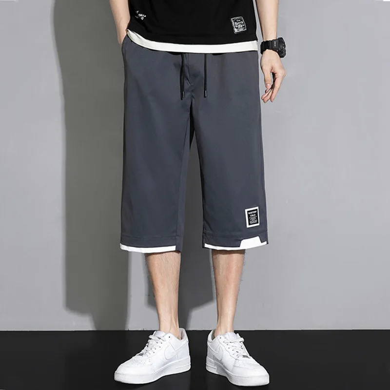 Summer Man Versatile Casual Shorts Koreon Streetwear Fashion Elastic Waist Baggy Khaki Black Green Big Size New Capri Pants 8XL