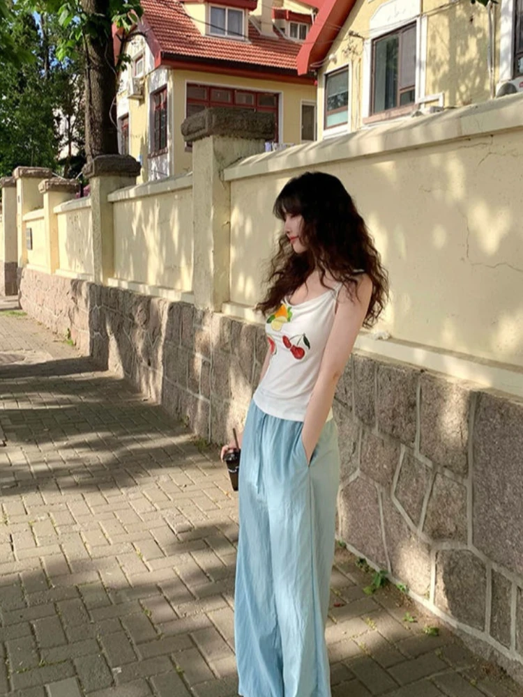 เสื้อกล้ามคอวีพิมพ์ลายผลไม้สีสันสดใสสไตล์อเมริกันหวานซ่อนเปรี้ยวสำหรับผู้หญิง