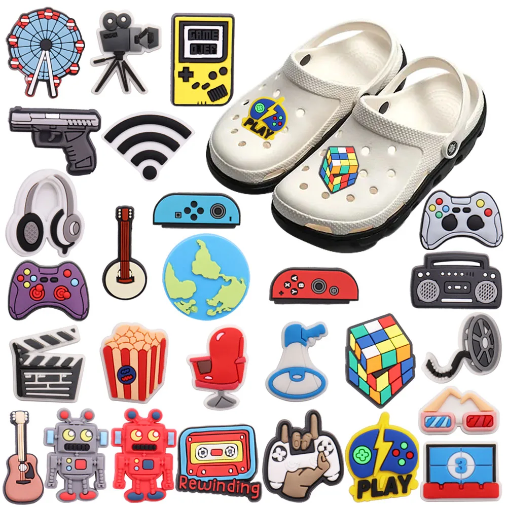 1 pz PVC Shoe Charms Console di gioco Popcorn Movie Speaker Gun Wifi ruota panoramica Earth Hole Slipper Decoration Bands bracciali