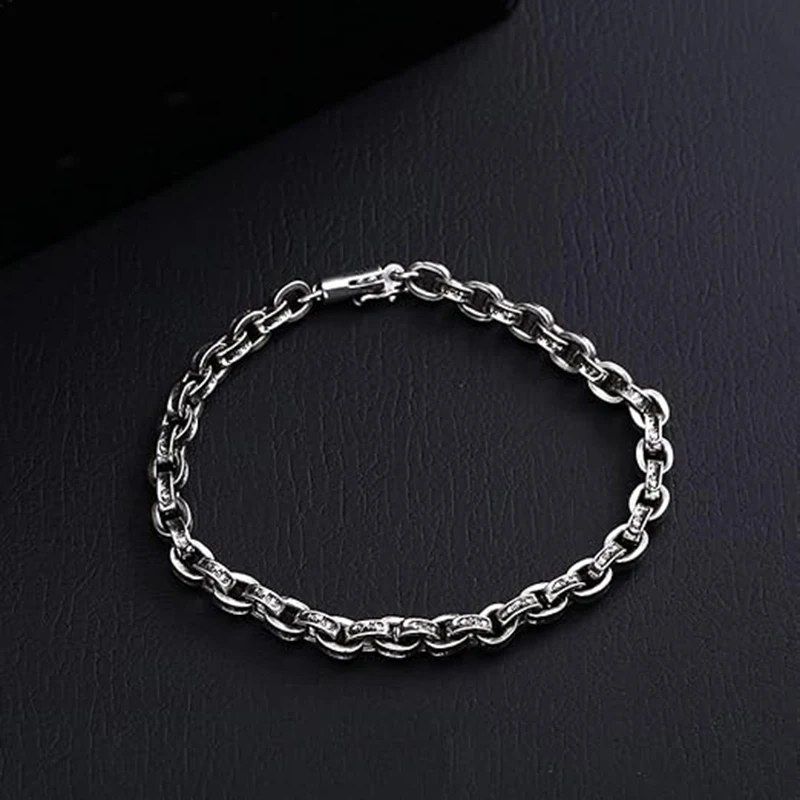 قلادة وسوار فضي اللون، منقوشة بأنماط وتصميم مشبك توقيع عام 1995. #4