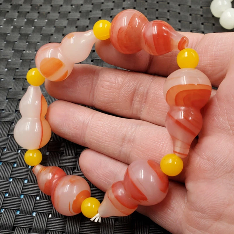 

Hotan foreign Mongolian material , imitation blood jade three-dimensional gourd bracelet