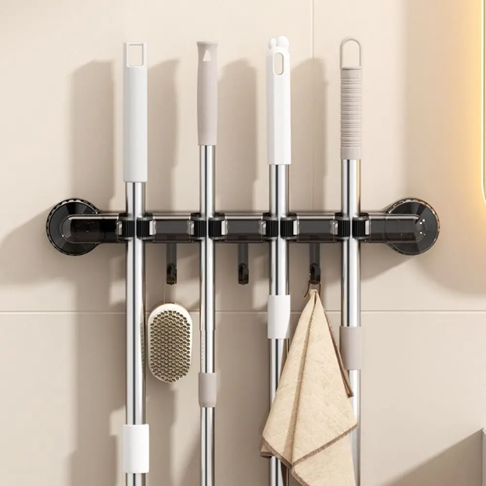 

Practical 4 Clips Suction Cup Mop Holder Traceless Space Saving Mop Clip Holder with Hooks Plastic Broom Hanger for Home