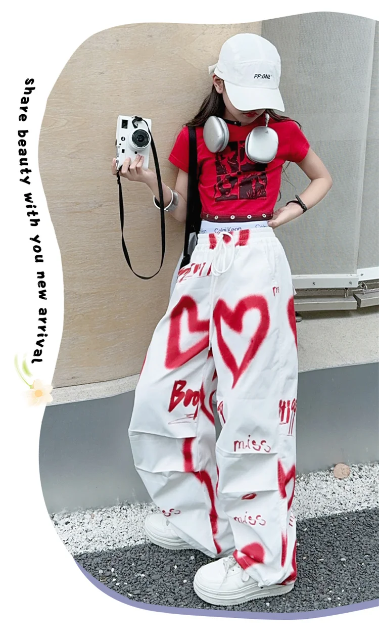 Kinder Hip-Hop Modehose mit Kordelzug und Zeichnungen für Teenager-Mädchen Coole Y2K Streetwear-Hose mit Herz-Graffiti 5-14 Jahre – Detail 4