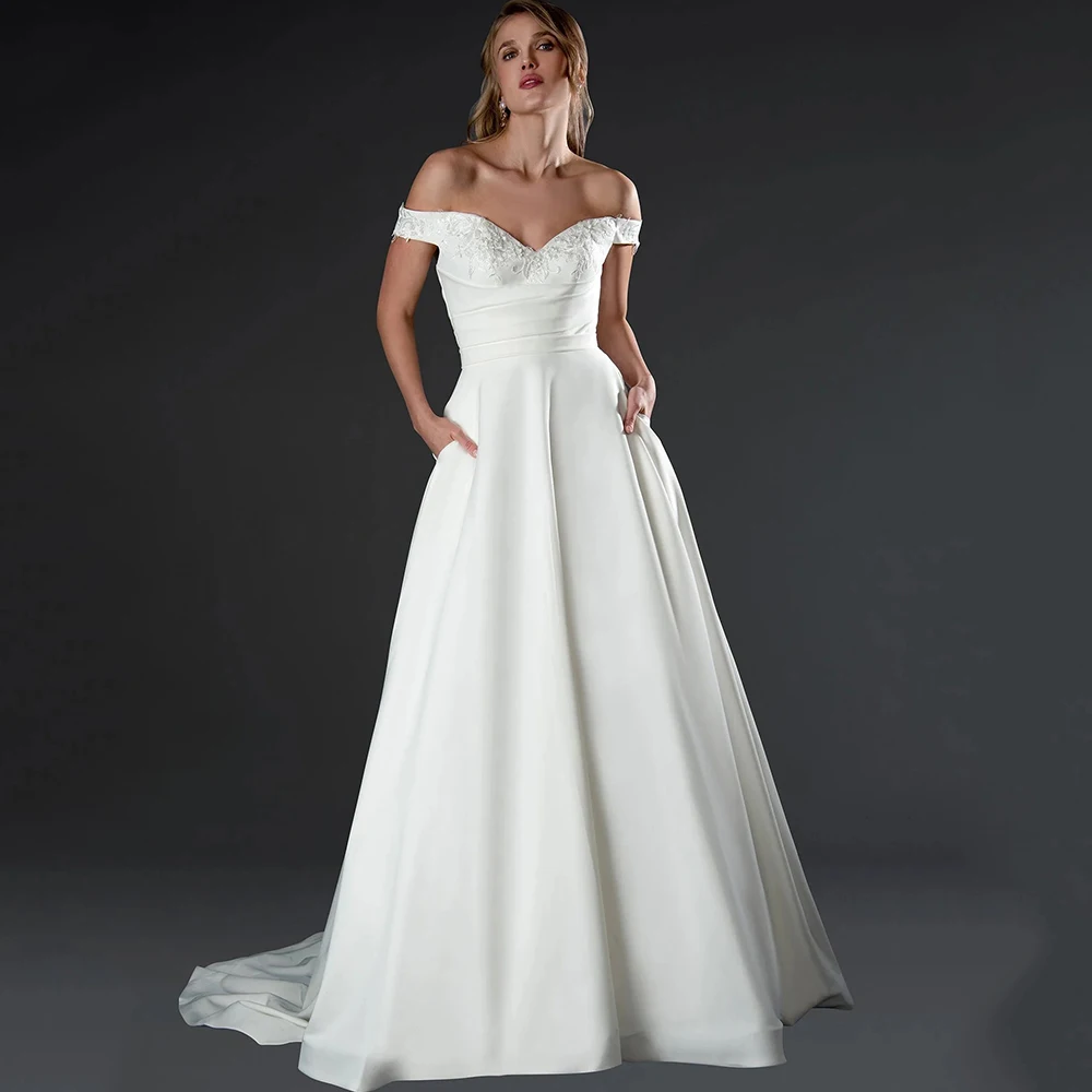 

Classic A-Line Floor Length Wedding Dress V-Neck Off the Shoulder with Applique and Pleat Bride Pocket Sweep Train Marriage Gown