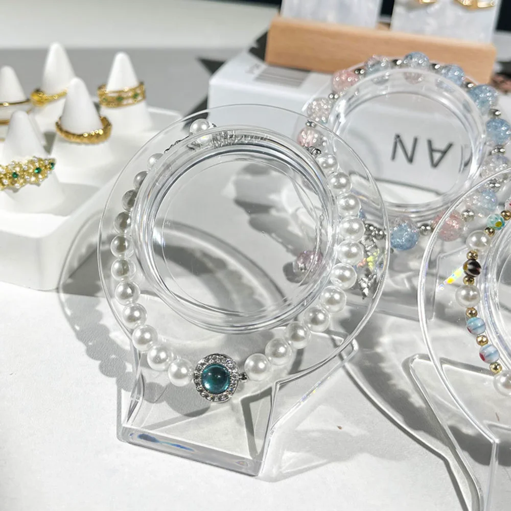حامل دعامة المجوهرات من الأكريليك قاعدة عرض الأساور من الأكريليك عرض حامل مجوهرات شفاف لخلع الملابس #1