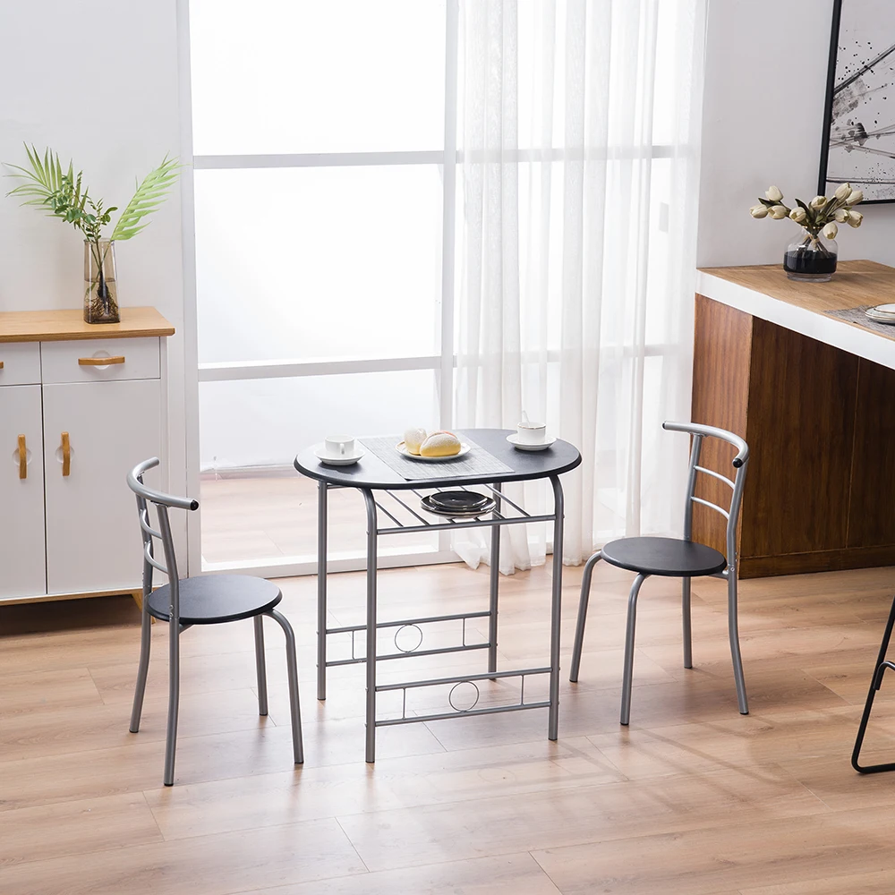 Compact Oval Dining Table Set with Two Chairs Perfect for Small Spaces