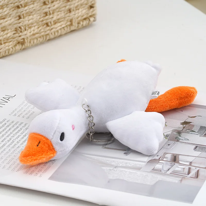 Porte-clés d'oie en peluche de dessin animé, oreiller de beurre, jouets de canard moelleux, animal mignon, 1PC