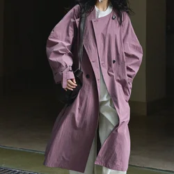 Autumn and winter women's casual solid color round neck long-sleeved belt decoration loose long trench coat