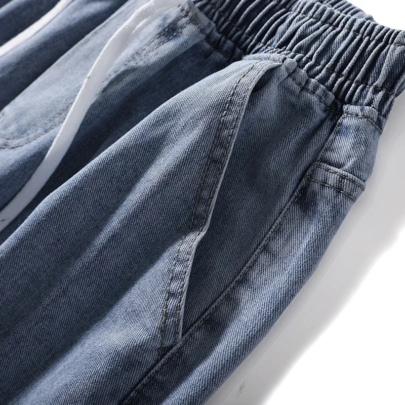 الرجال الدانتيل متابعة تمتد واسعة الساق الجينز 2025 جديد عصري موضة فضفاض سراويل تقليدية العلامة التجارية الكلاسيكية مرونة الخصر الذكور سراويل جينز