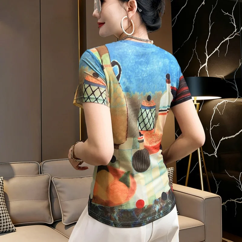 European Clothing Ladies T-shirt 2026 Summer New Short Sleeved Graffiti Printed Sunscreen Fashion Mesh Tops Casual Blouse