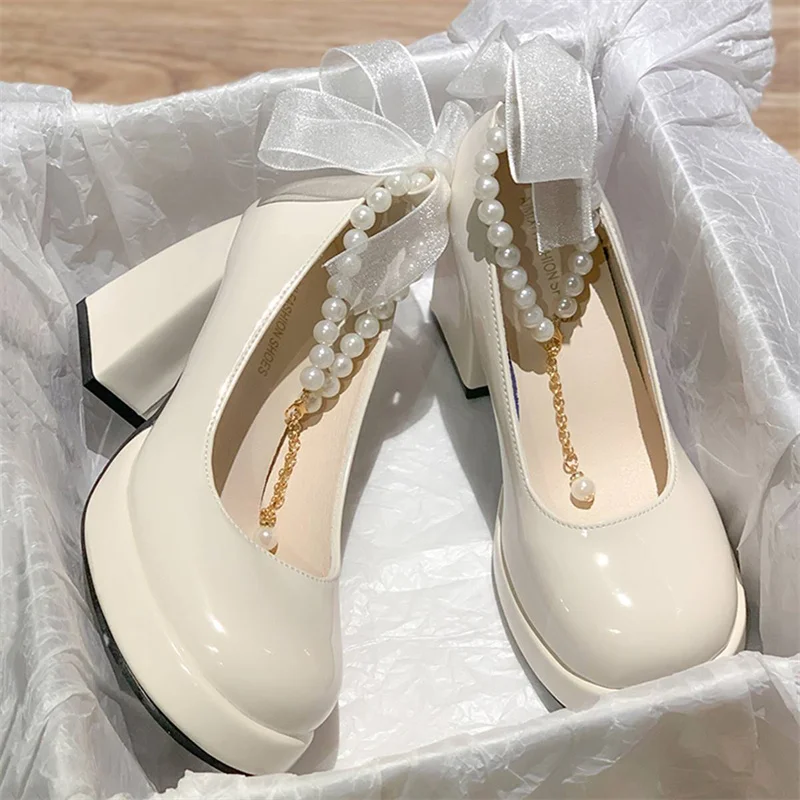 Oulylan-zapatos de tacón alto para mujer, calzado elegante con lazo y punta cuadrada, color negro, tacón grueso, con encaje de perlas, para fiesta de boda