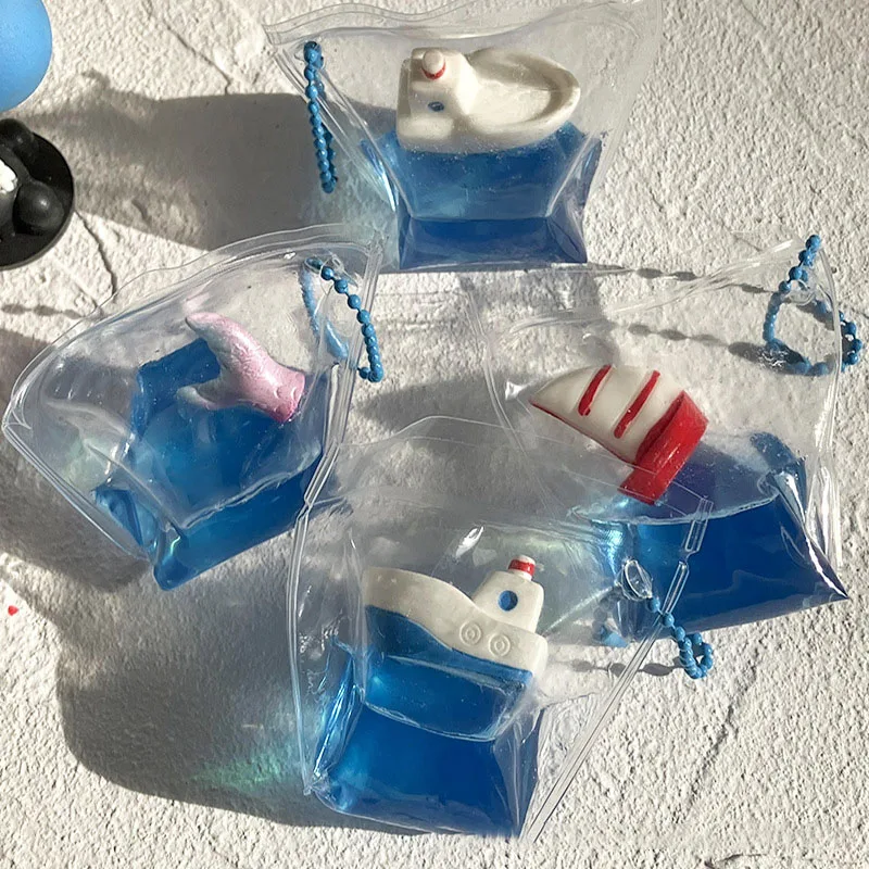 Kreative Stimmung lustige Silikon blau transparent Fluss Ozean Schiff Segelboot Meerjungfrau Schwanz Prise Prise Tasche Anhänger zappeln squishy Spielzeug