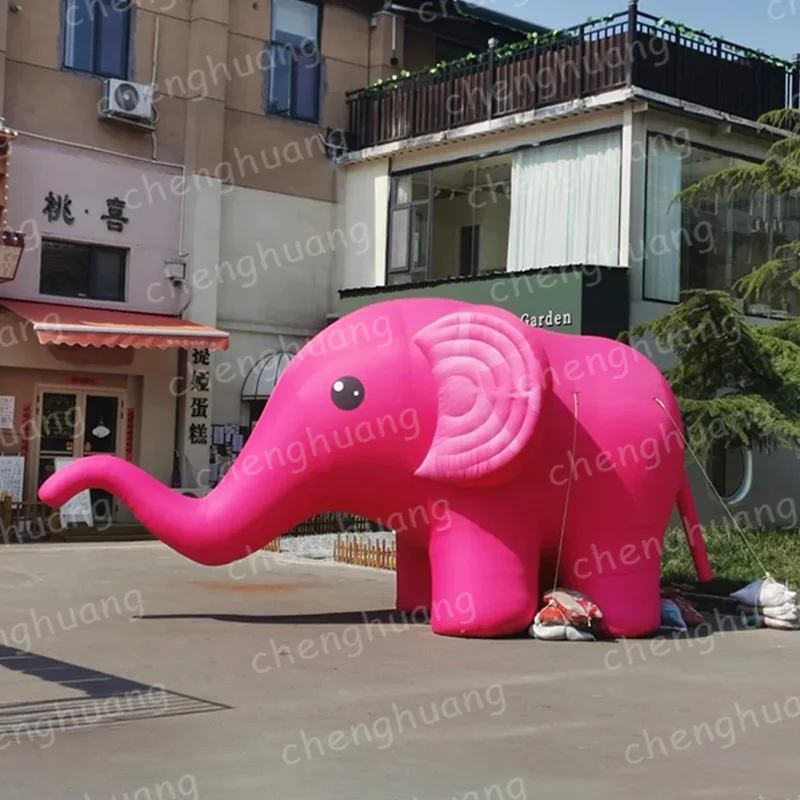 ช้างเป่าลมสีชมพู พร้อมเครื่องเป่าลม โมเดลอากาศรูปสัตว์ อุปกรณ์ประกอบฉากตกแต่งส่งเสริมการขายสี่เหลี่ยมกลางแจ้ง
