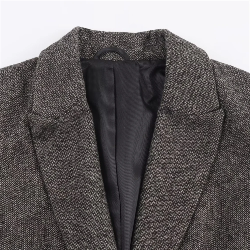 Jaket setelan wanita gaya kerja musim gugur dan musim dingin terbaru dengan kerah lipat, lengan panjang, bantalan bahu, dan pola herringbone.