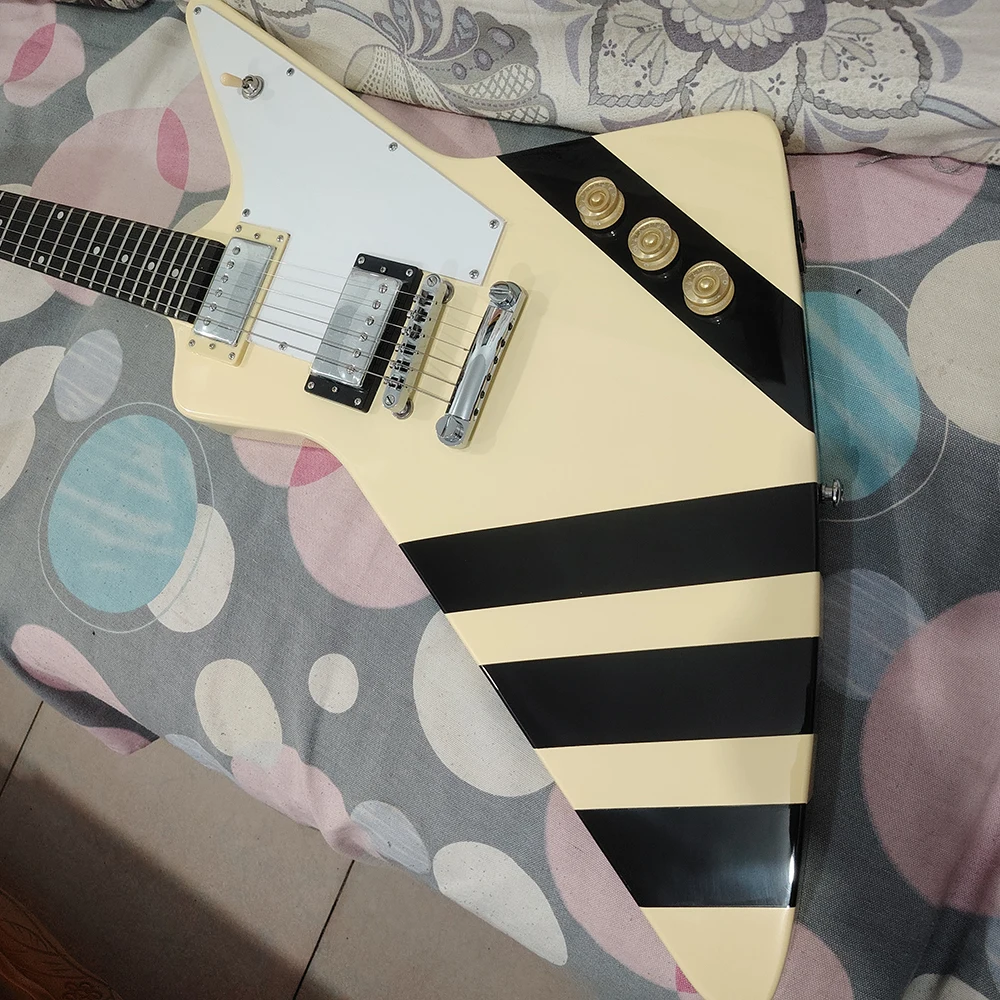 High quality milky yellow shaped electric guitar with black lines on the body, available for quick delivery