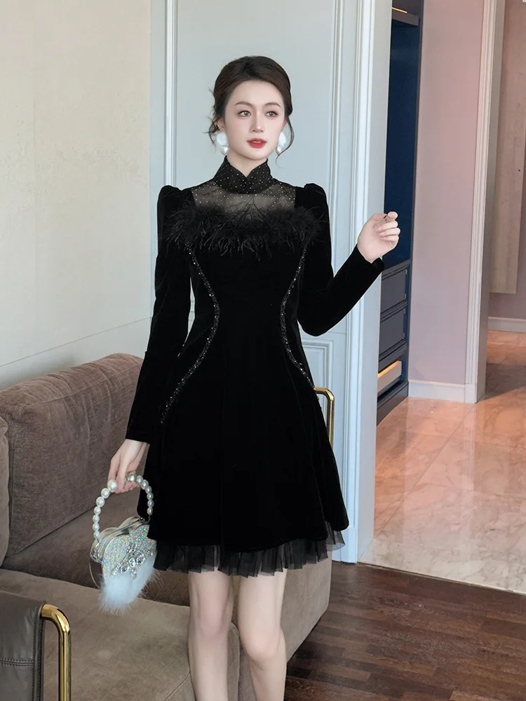 Lente nieuwe dames Franse opstaande kraag taille afslankende zwarte onregelmatige fluwelen jurk