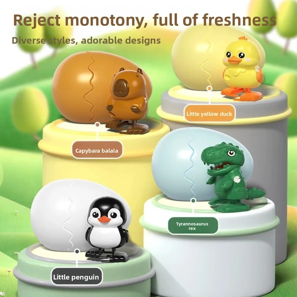 Juguete de huevo saltador de pato con mecanismo de relojería portátil, puede caminar y romper la concha, bestia bonita, pequeño pingüino, huevo saltador