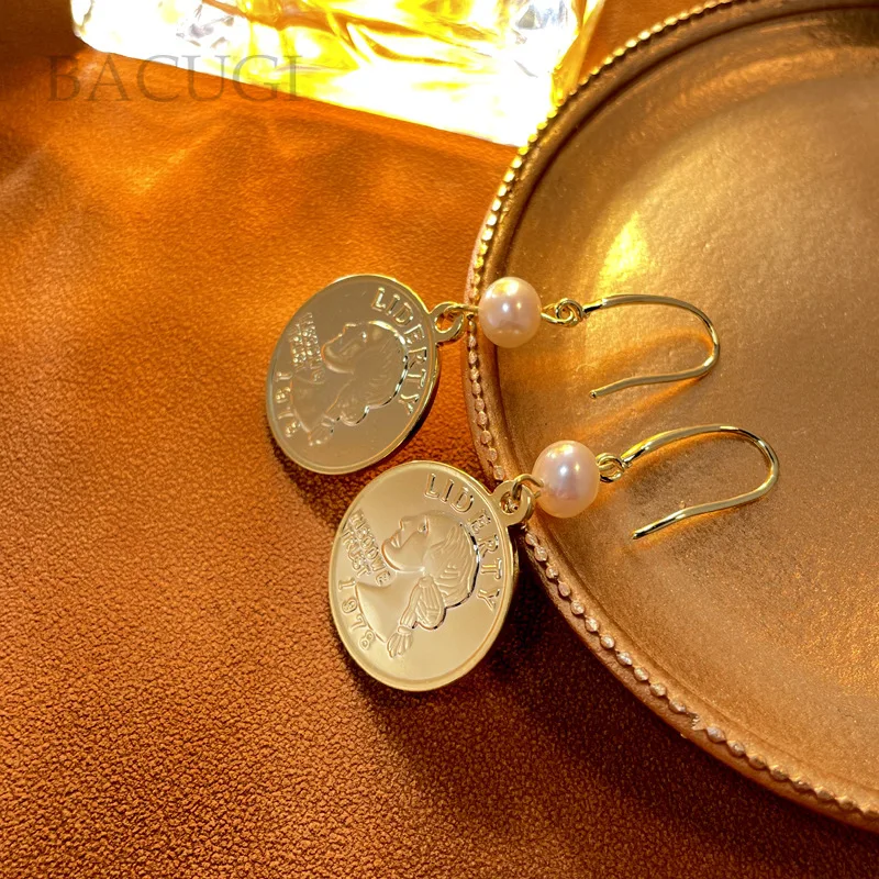 

Серьги-капли с природным пресноводным жемчугом 18 кгF