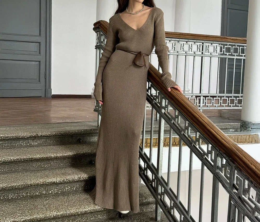 

Solid color long sleeved dress 2025 autumn and winter new style temperament V-neck slim fit hip hugging knitted long skirt