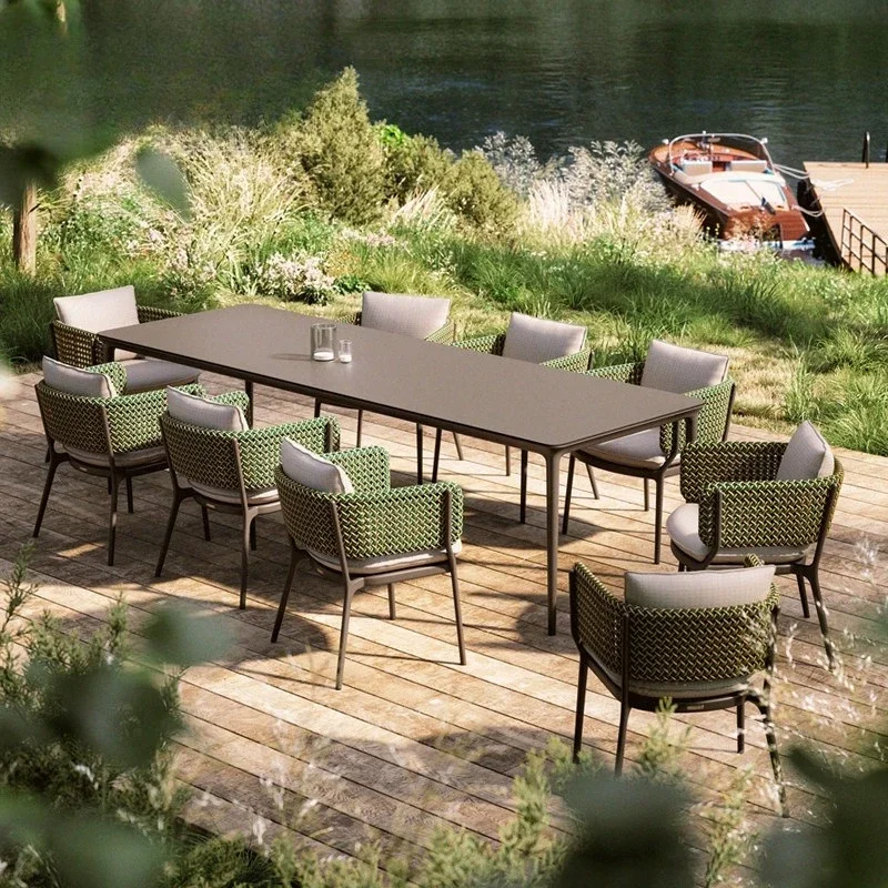 Outdoor villa table and chair combination courtyard garden slate long table leisure hotel B&B vacation metal rattan chair