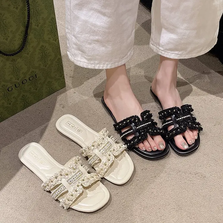 

Luxury small fragrant style fashionable flat bottom anti slip external wearing slippers summer new fairy style beach slippers
