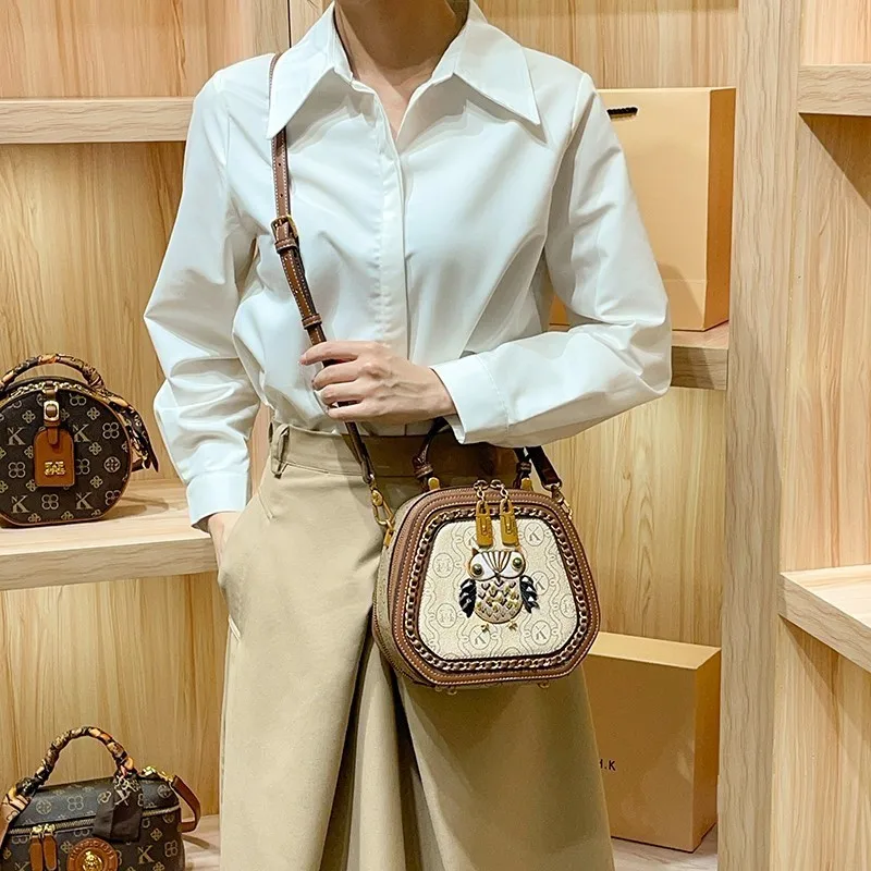 Light luxury brand designer women's handbag 2025 new fashionable high-end handbag crossbody shoulder bag small round bag