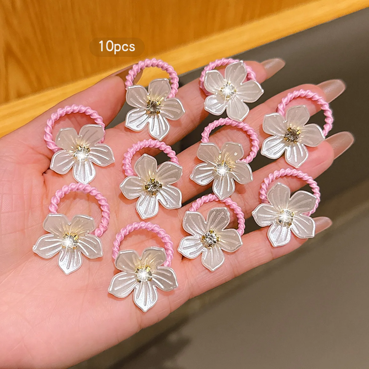 10 flower shaped rubber bands with simple hair extensions suitable for daily use as headwear