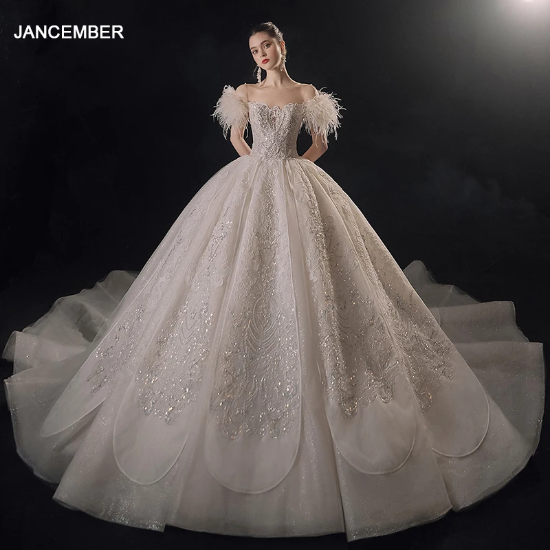 

Jancember First-rate Brand New Wedding Dresses 2024 Sequins Organza O-Neck Short Sleeves With Feathers Backless Vestido Noiva