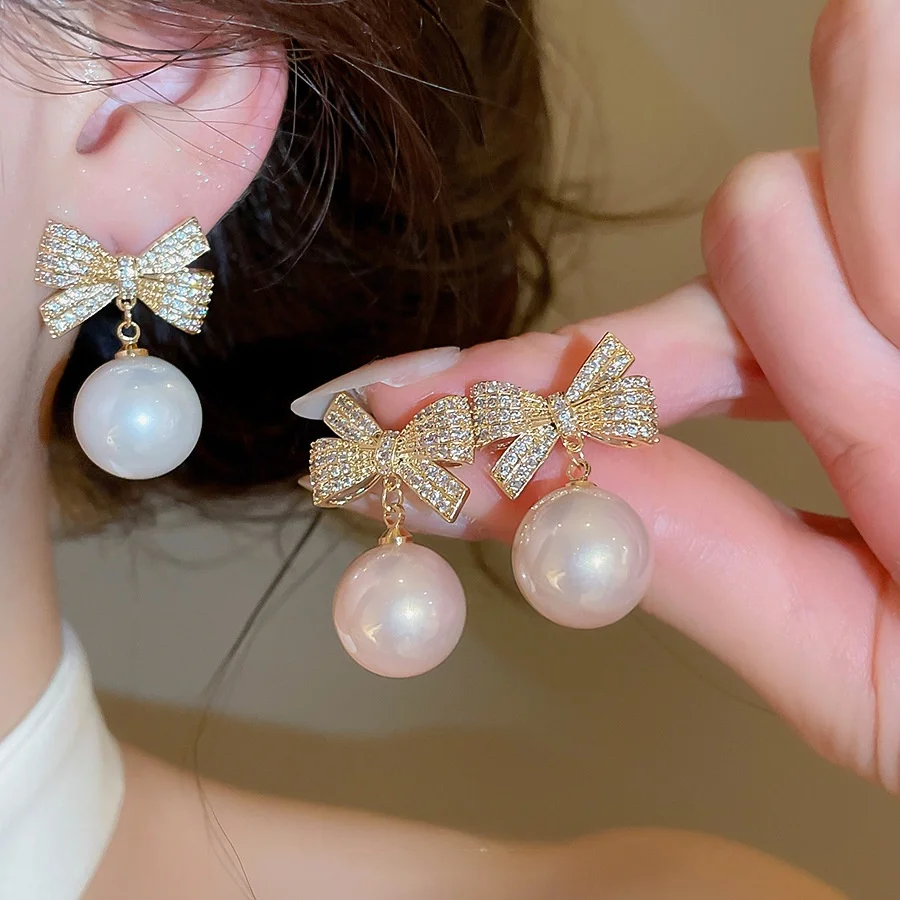 brincos-elegantes-de-perola-com-agulha-de-prata-e-laco-de-borboleta-design-luxuoso-e-brilhante-para-mulheres-acessorios-de