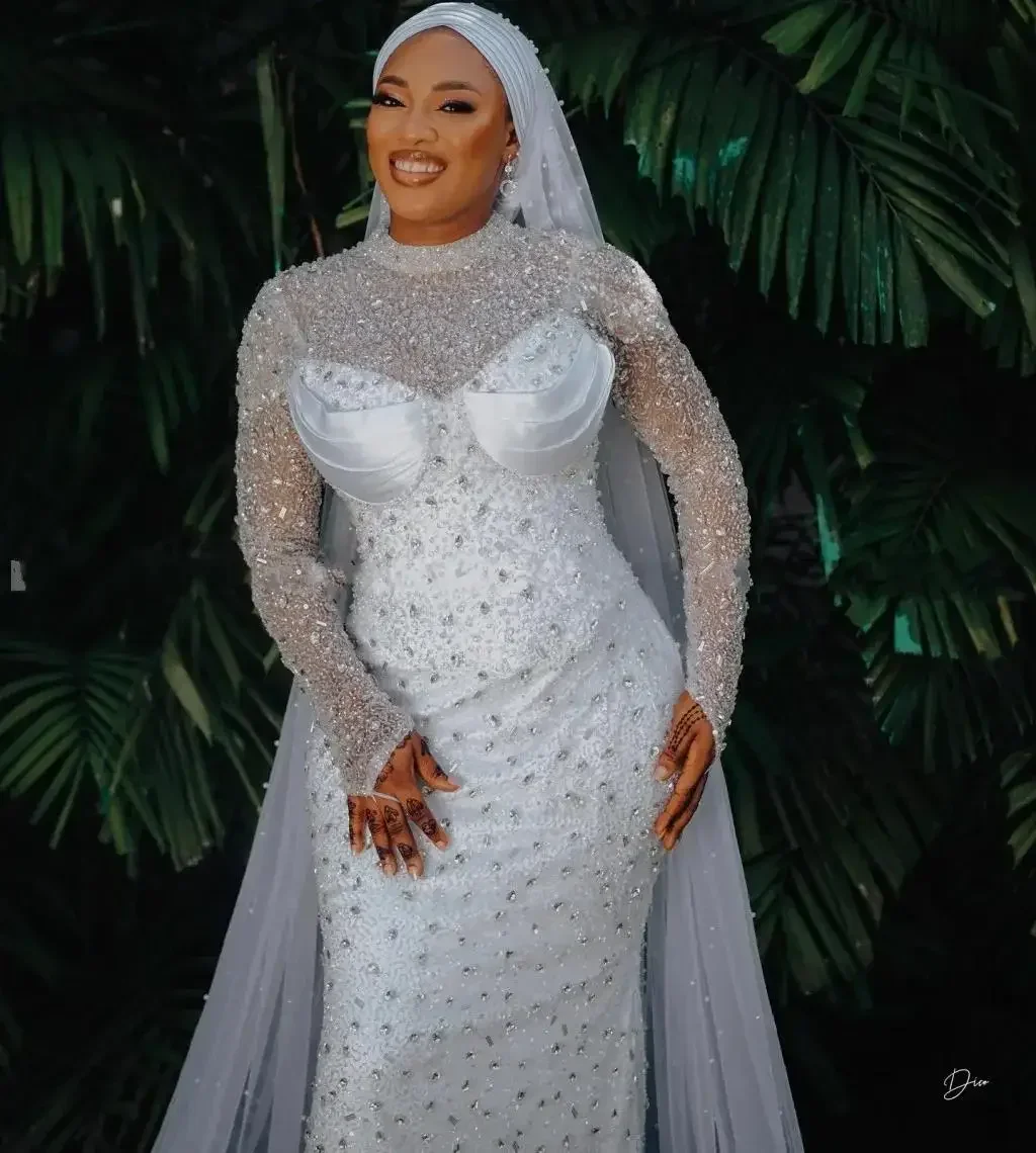 

Customized Full Crystals Beads Mermaid Wedding Dress Vestidos De Novia Illusion Long Sleeves Garden African Bridal Gowns