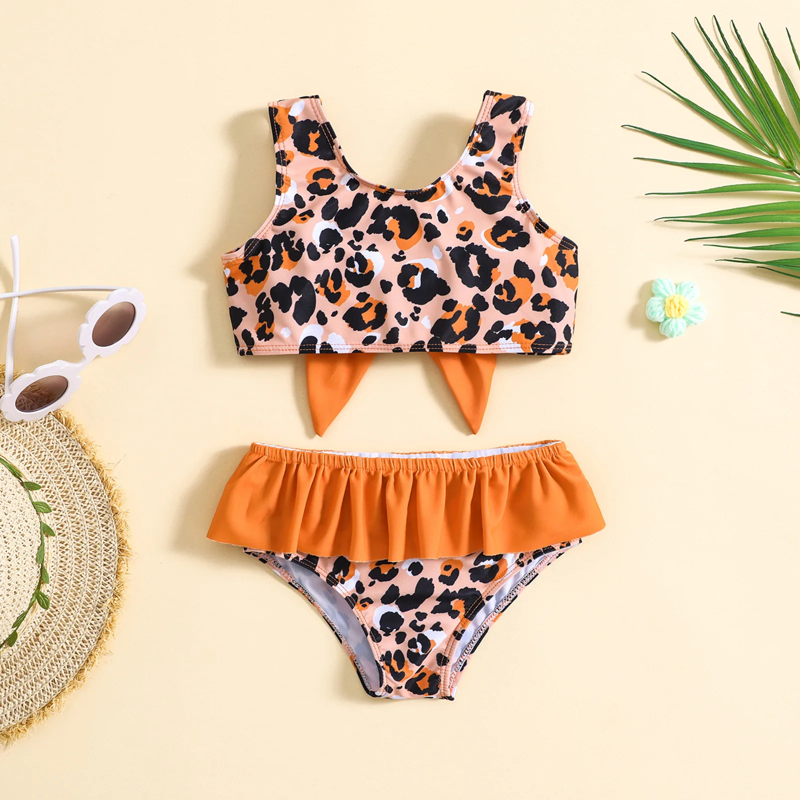 Baby two piece swimsuit with leopard print and big bow,skirted bottom,suitable for seaside and pool play