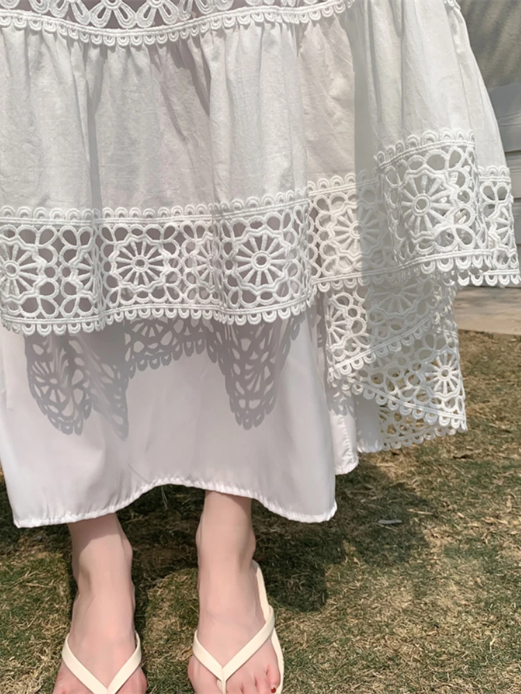 Boho oeillet dentelle broderie ourlet jupe longue d'inspiration vintage été a-ligne jupe à plusieurs niveaux avec taille élastique vacances à la plage