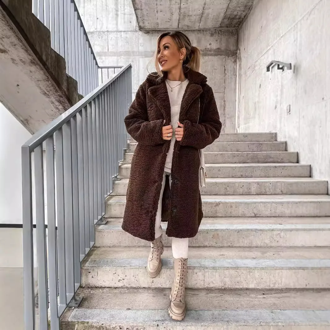 Autumn and winter cross-border women\'s clothing hot item furry long sleeved lapel women\'s plush on top Long coat