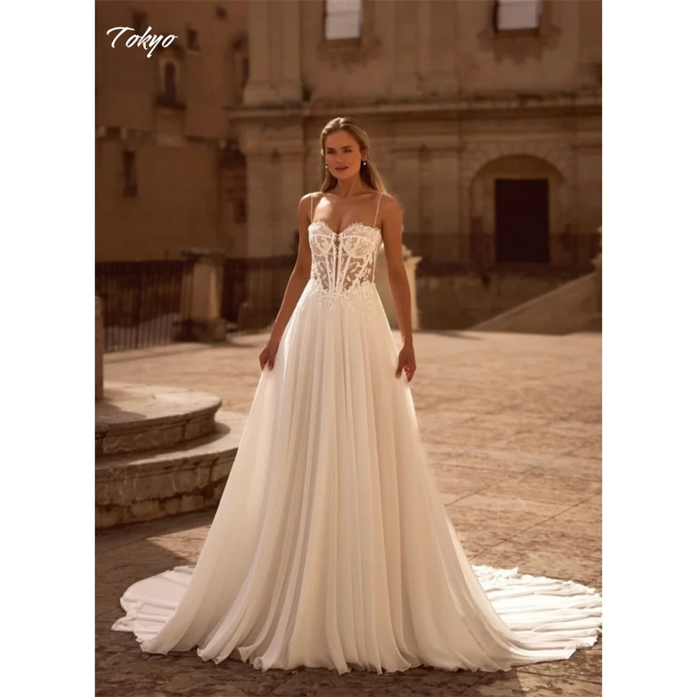 Tokyo Customized White Spaghetti Strap Wedding Dresses Sleeveless Tulle Court Train Bridal Gown Back Zip A-Line Wedding Gown