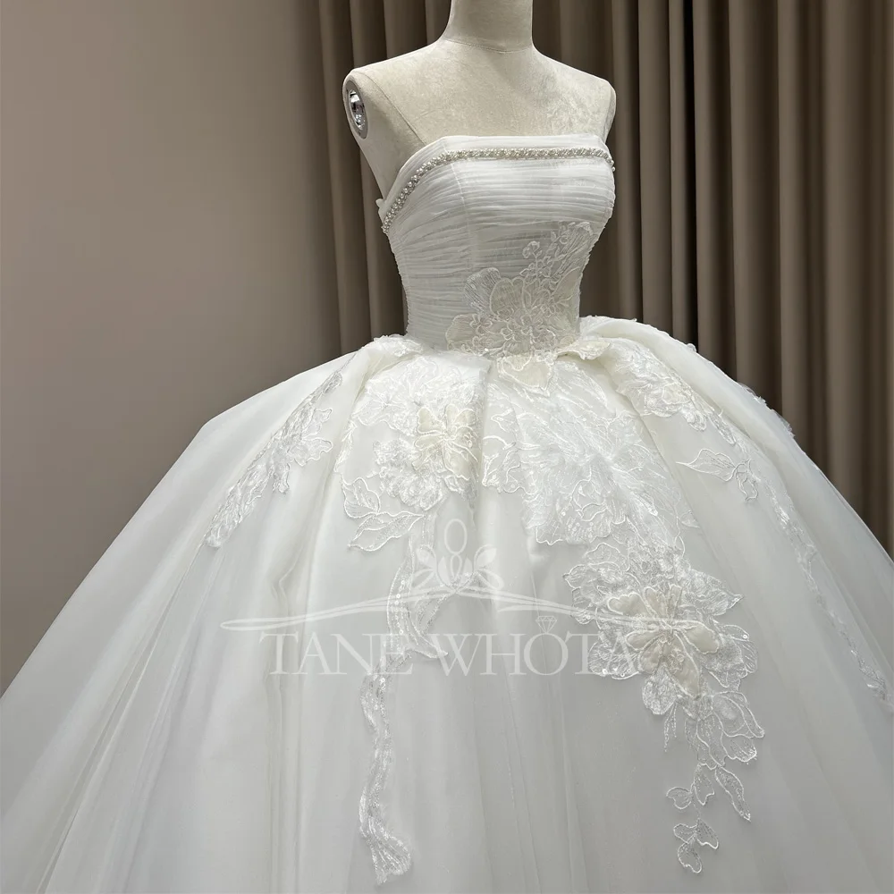 Suknia ślubna 2025 без бретелек без рукавов на шнуровке сзади бальное платье с вышивкой бисером свадебное платье по индивидуальному заказу роскошное