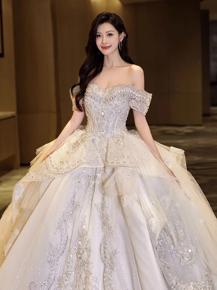 

Princess Off The Shoulder Wedding Dress Sequins Diamond Sequins Applique Boat Neck Ruffle Ivory Woman Celebrity Bride Gowns New