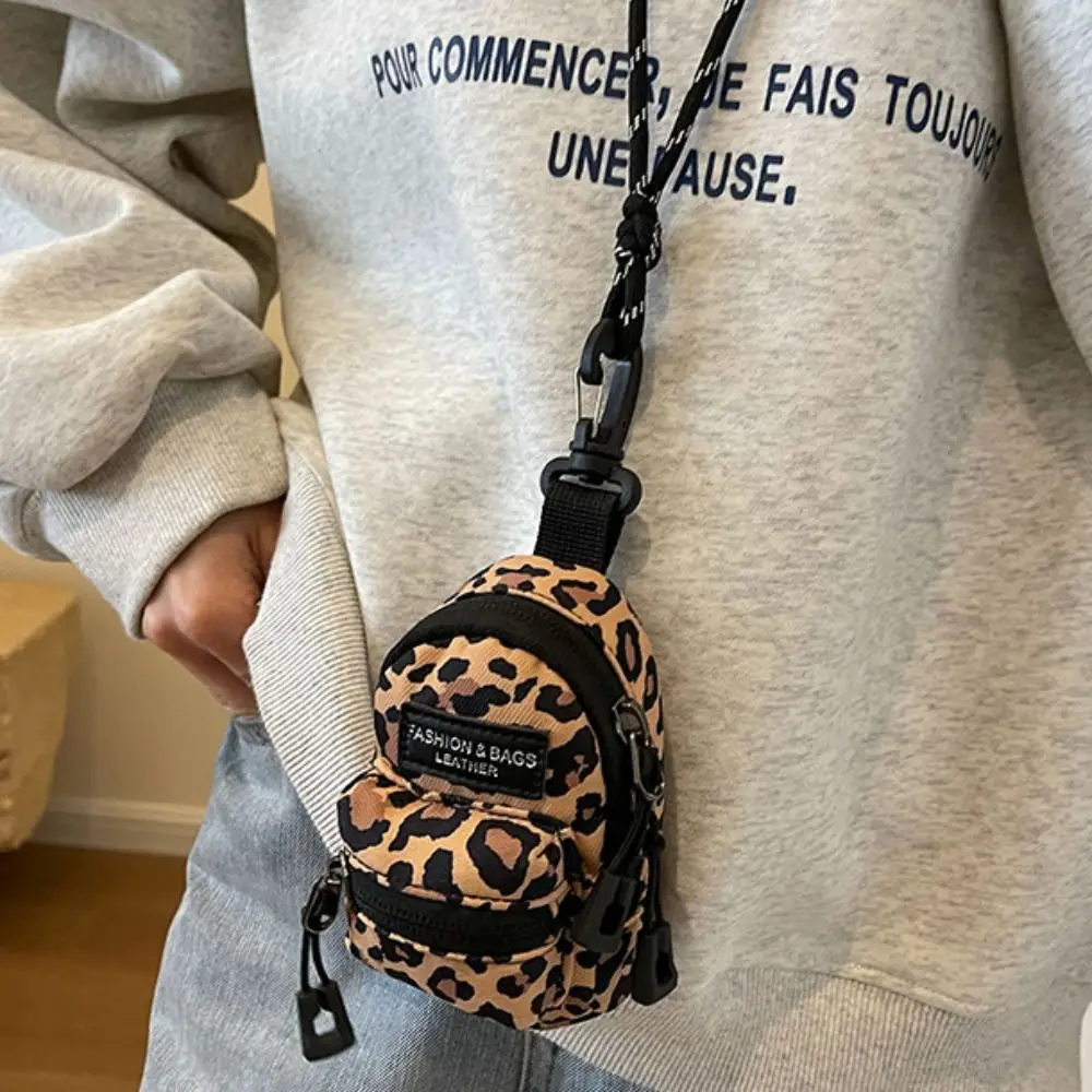 Bolsa crossbody portátil para homens e mulheres, mini porta-moedas, casais, fone de ouvido, chave, bolsas de ombro, hip hop, casual, mais recente