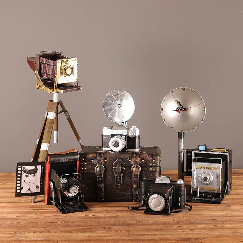 Wrought iron retro camera ornament, nostalgic old-fashioned objects, shop window arrangement, wine cabinet decoration, live
