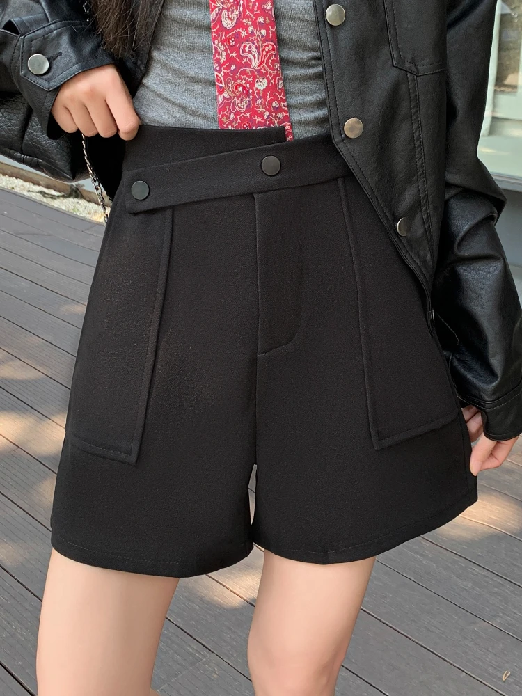 Shorts de perna larga de lã irregular para mulheres no outono e inverno 2025 novo bolso de cintura alta emagrecimento calças curtas linha A