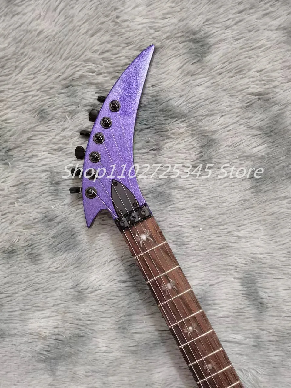 6-string skull electric guitar, metal purple paint, rosewood fingerboard, black accessories, tremolo system, shipping cost to be